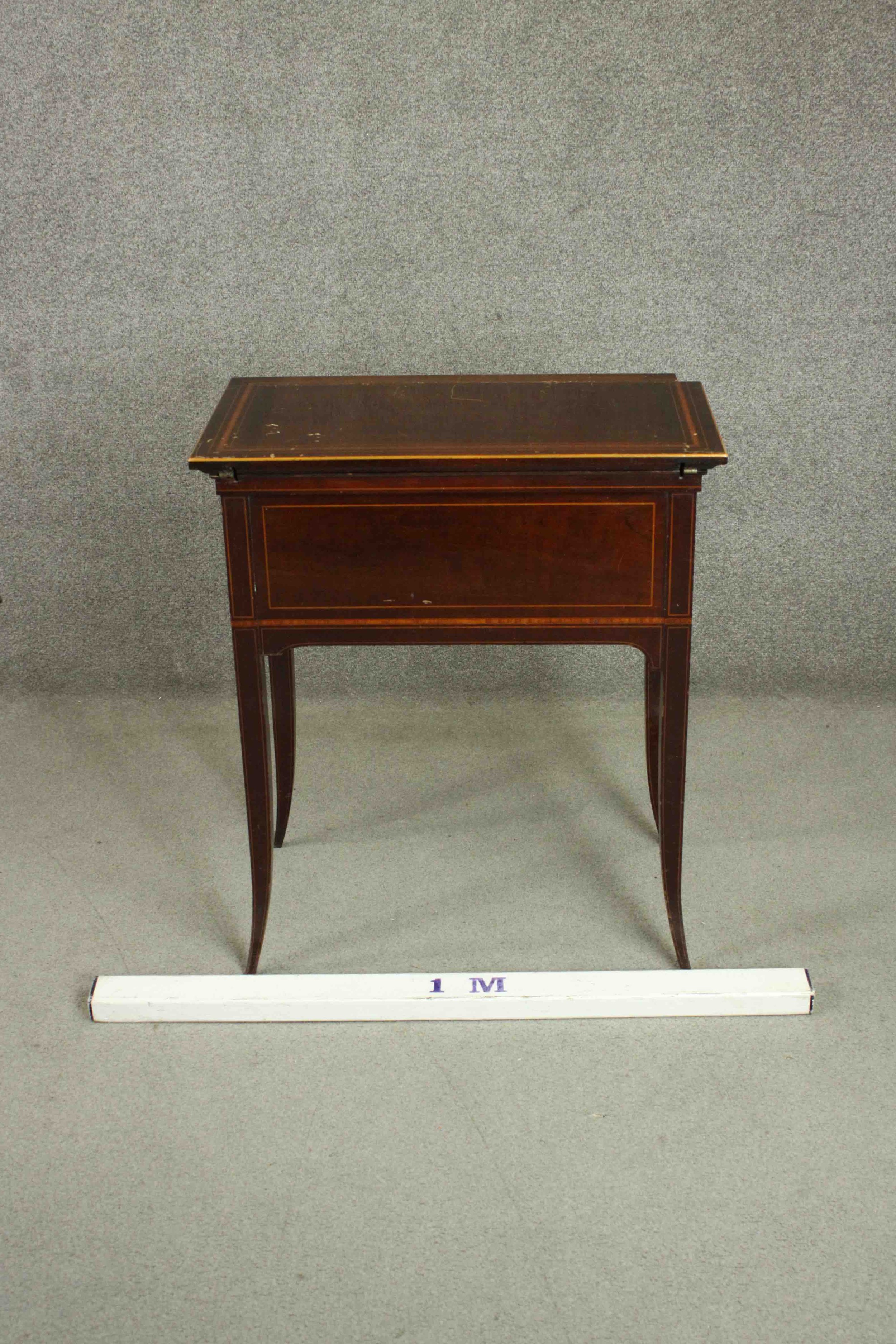 A circa 1900 mahogany and satinwood inlaid writing table, of rectangular form, the top opening to - Image 4 of 9