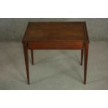 A circa 1960's teak sewing table, possibly Danish, of rectangular form with a single fitted