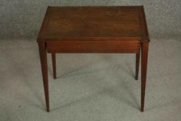 A circa 1960's teak sewing table, possibly Danish, of rectangular form with a single fitted