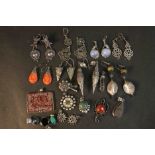 A collection of gem set earrings, pendants and other jewellery. The earrings are set with lapis