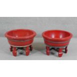 A pair of Chinese red lacquered coopered washbowls on stands, possibly Ningbo eastern China. H.