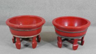 A pair of Chinese red lacquered coopered washbowls on stands, possibly Ningbo eastern China. H.