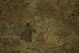 An early 20th century Aubusson style silk embroidery depicting three 18th century figures crossing a