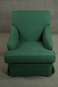 A Howard style armchair, upholstered in green fabric. H.80 W.64 D.83cm.