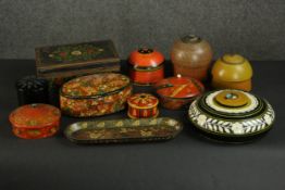 A collection of ten hand painted and inlaid boxes and an Indian papier mache hand painted pen