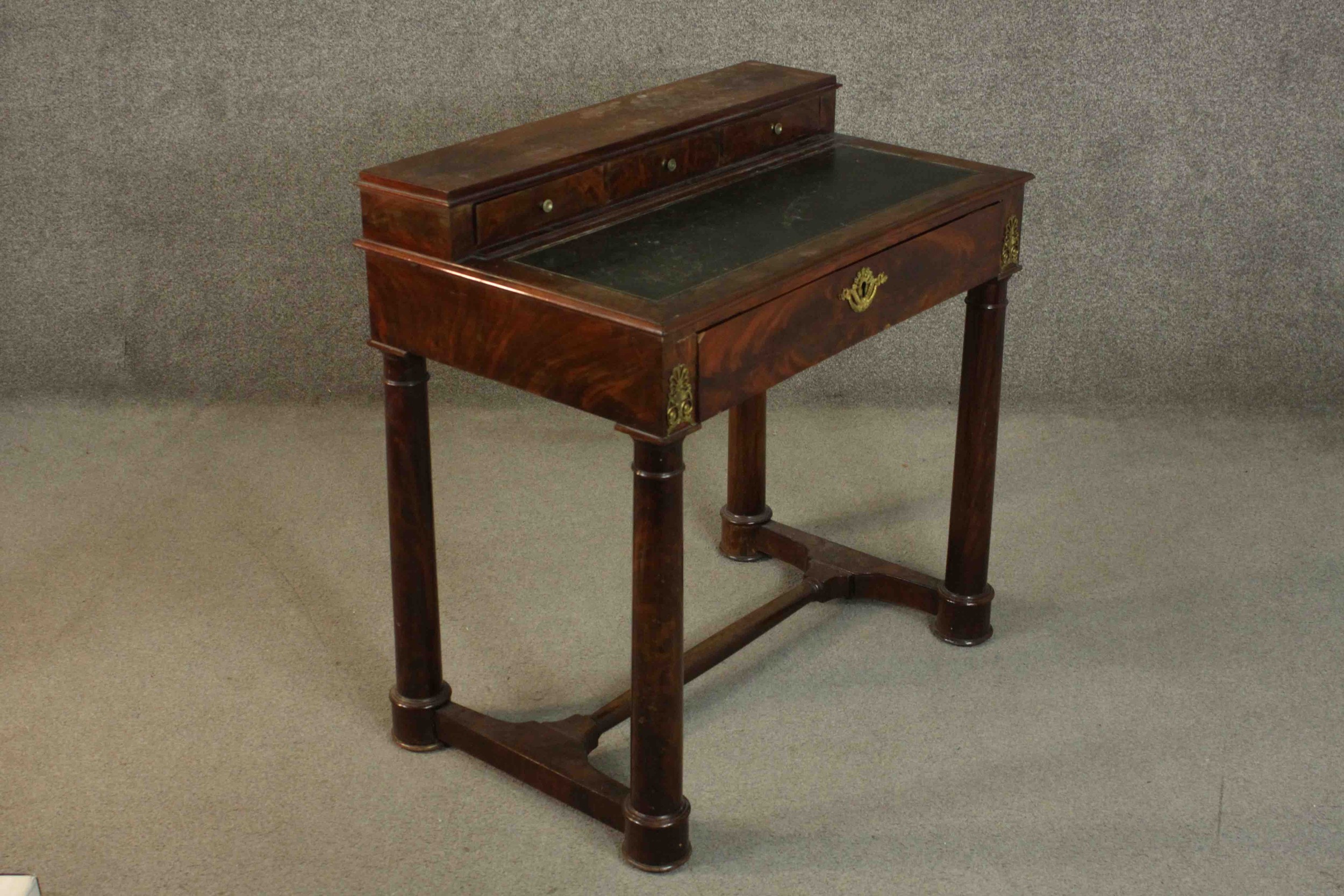 A French Empire flame mahogany writing table, the superstructure with three short drawers, over a - Image 3 of 9