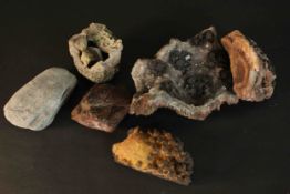 A collection of crystals and minerals, including a fossilised shell. H.23 W.17 D.10cm.