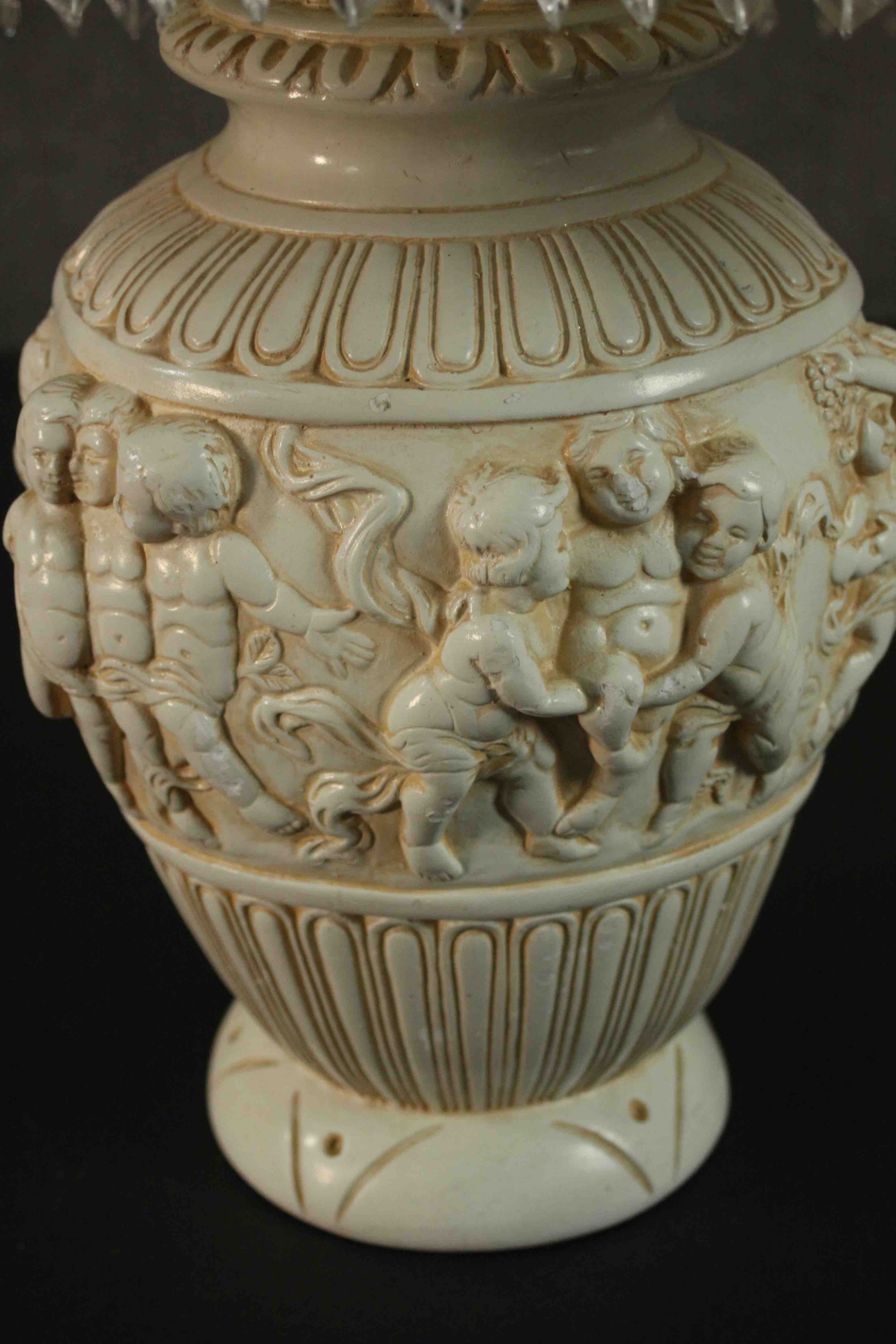 An ivory coloured resin table lamp, cast with a Bacchanalian scene, with a shade. H.67 W.40cm. - Image 3 of 4