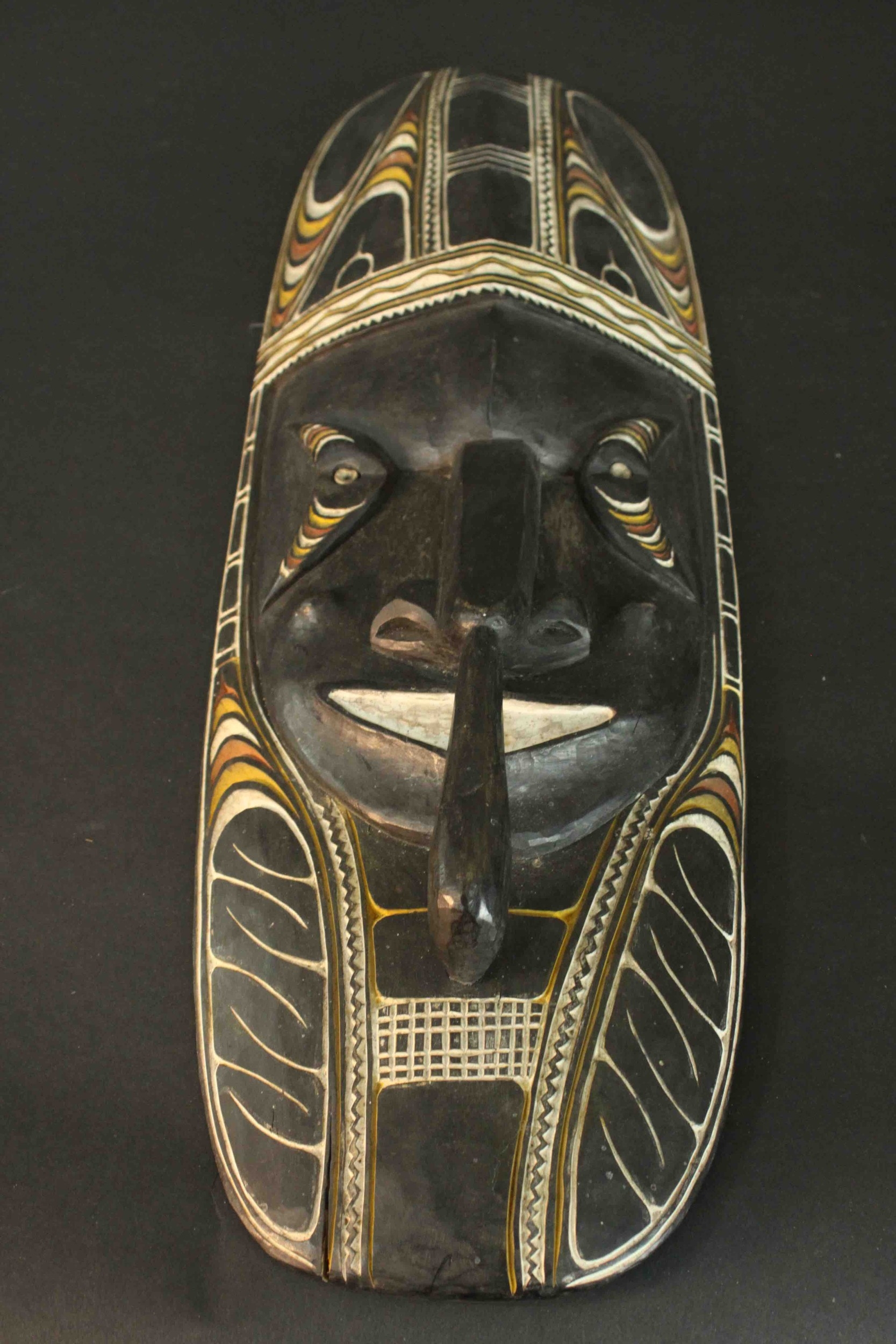 One ancestral mask from Papa New Guinea along with a painted and carved early 20th century African - Image 7 of 9