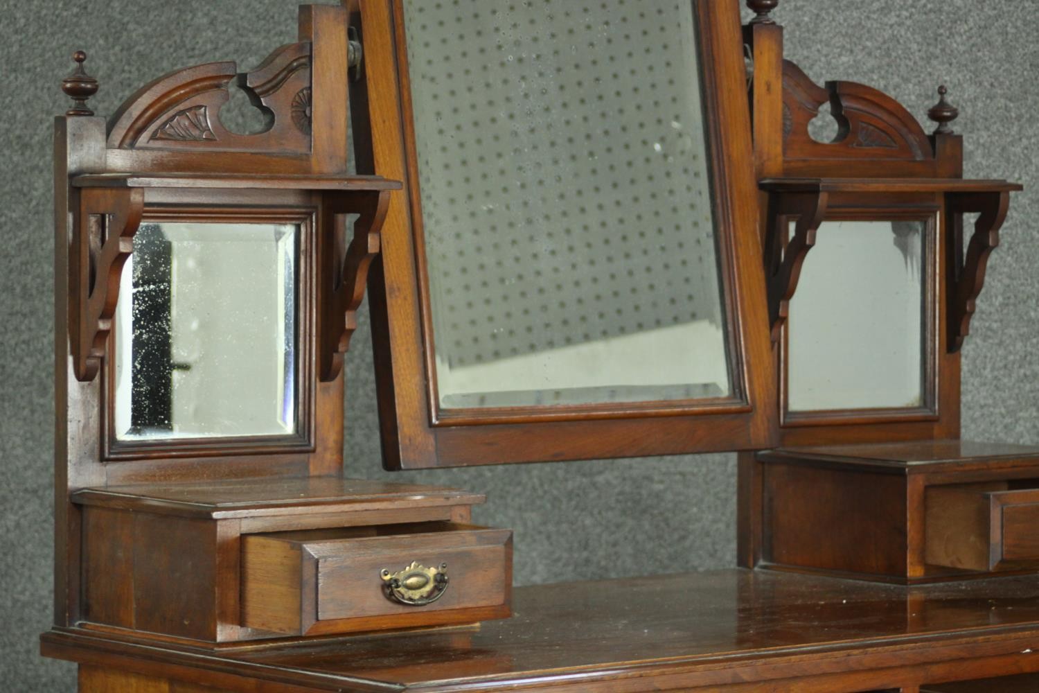 A late Victorian walnut dressing chest, with a central bevelled swing frame mirror, flanked by two - Image 6 of 11