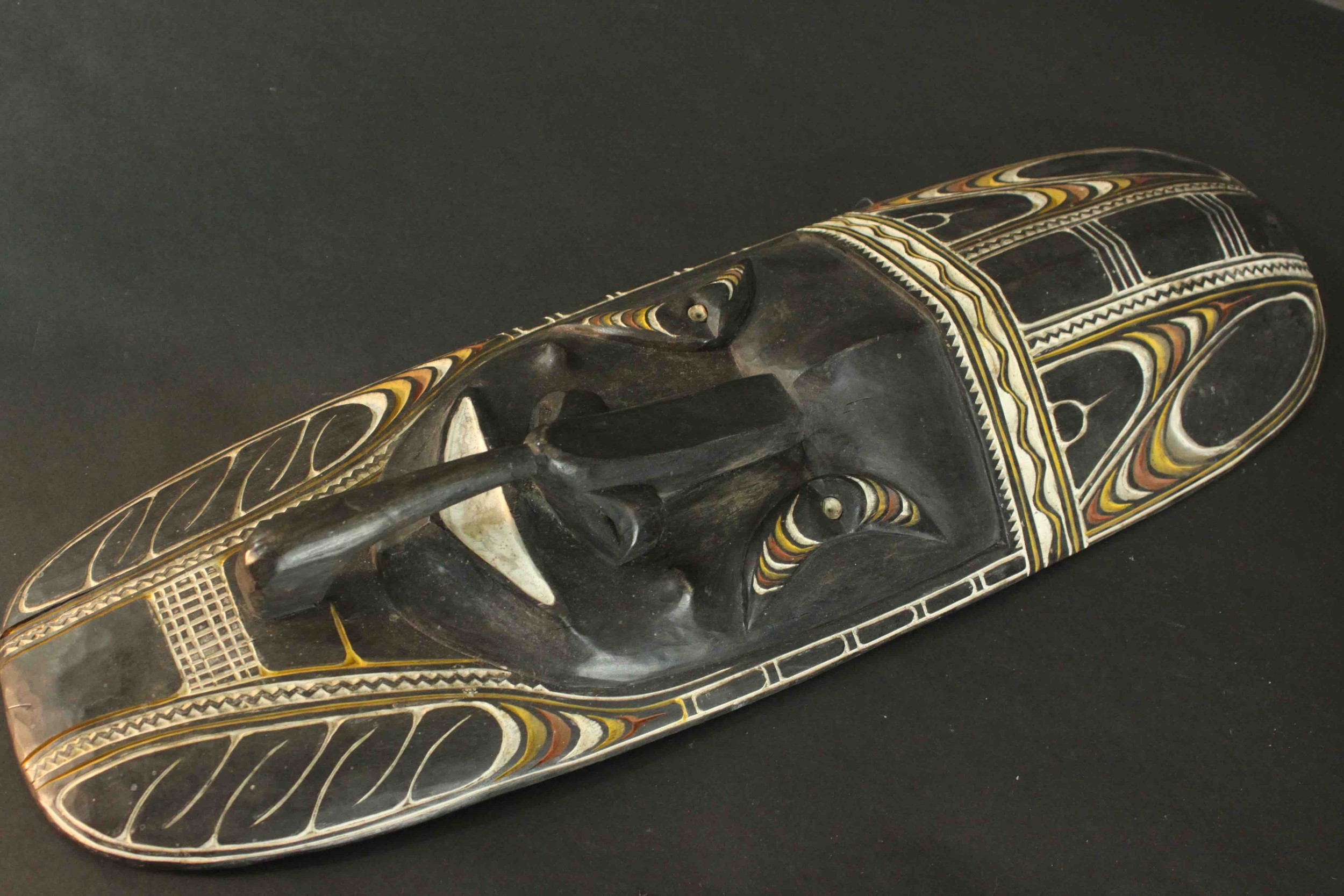 One ancestral mask from Papa New Guinea along with a painted and carved early 20th century African - Image 5 of 9