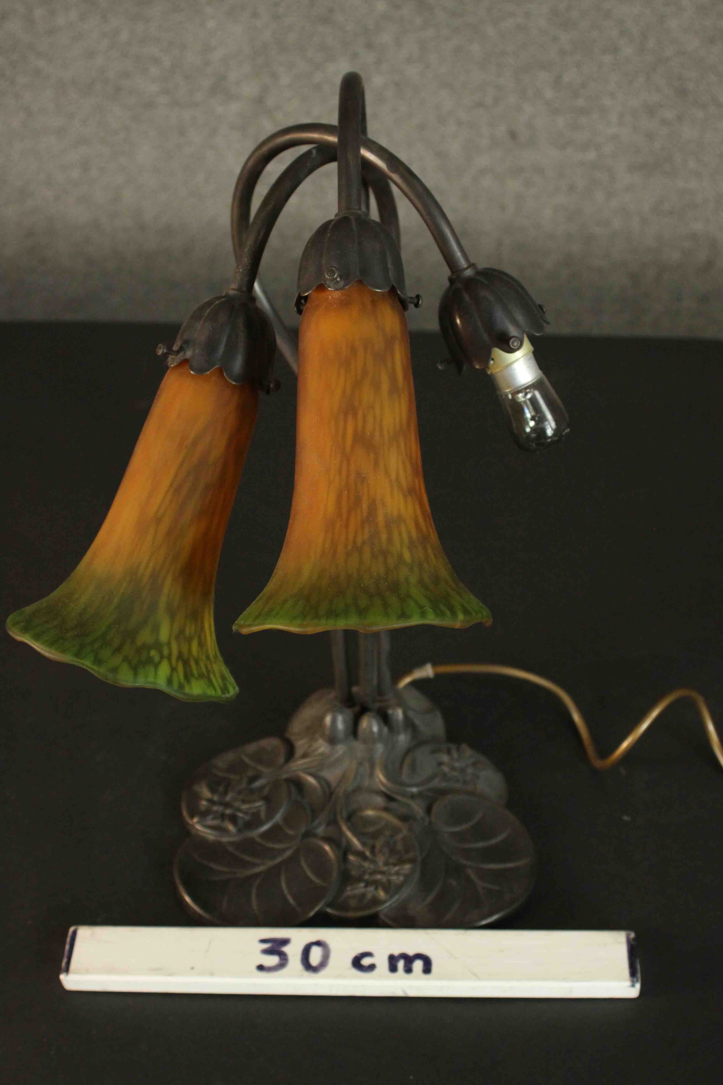 A reproduction Art Nouveau style table lamp, with two amber and green trumpet form glass shades, - Image 2 of 6