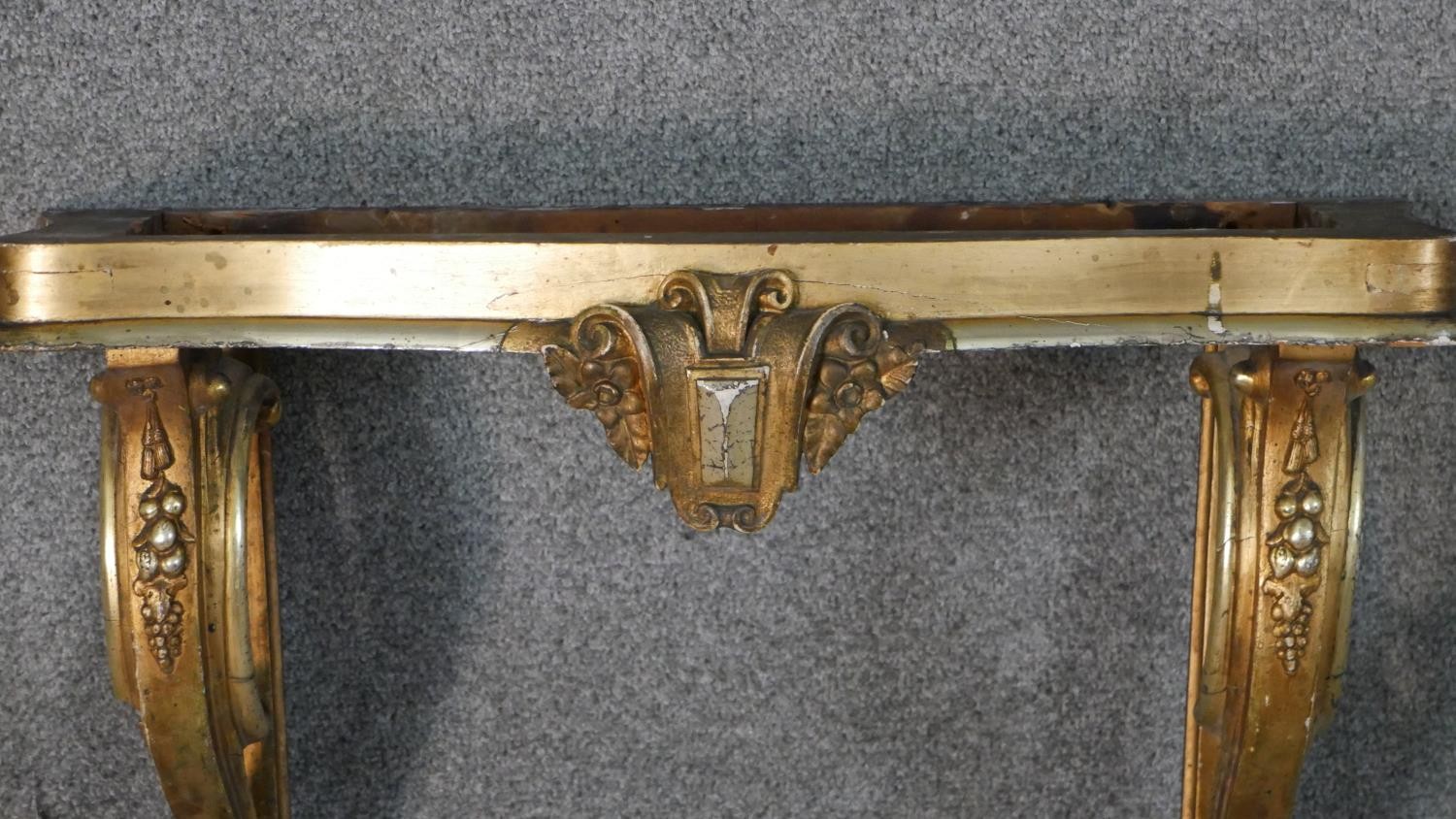 A 19th century Italian parcel gilt and silvered console table, wall mounted but missing the marble - Image 3 of 8