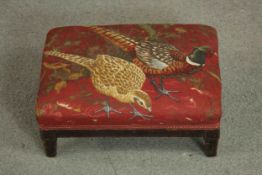 A 20th century foot stool with a padded tapestry top with pheasant design. H.15 W.37 D.28cm.