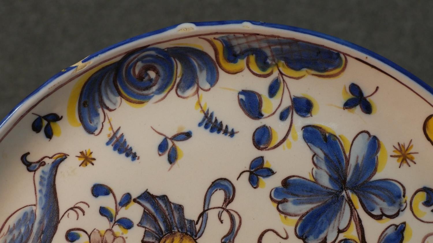 A FCA Sant'Anna Portuguese hand painted ceramic charger with a lady and a bird in the garden along - Image 4 of 10