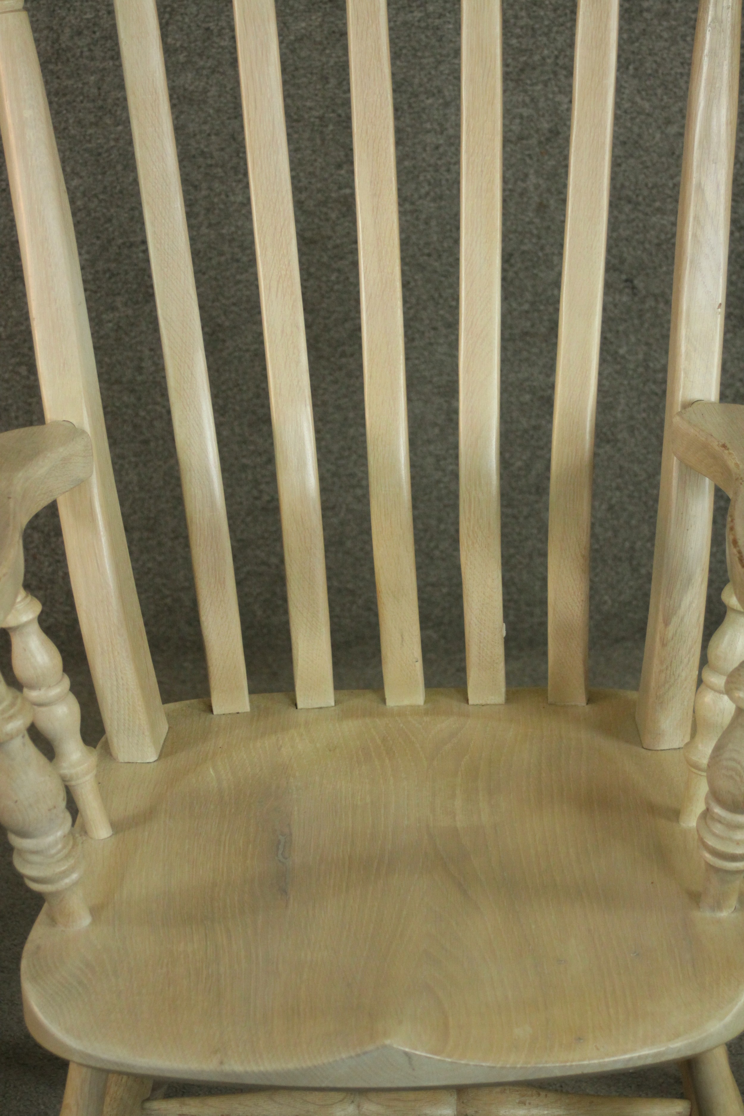 A pair of late 20th century oak Windsor carver chairs, with a comb back above a shaped seat on - Image 9 of 10