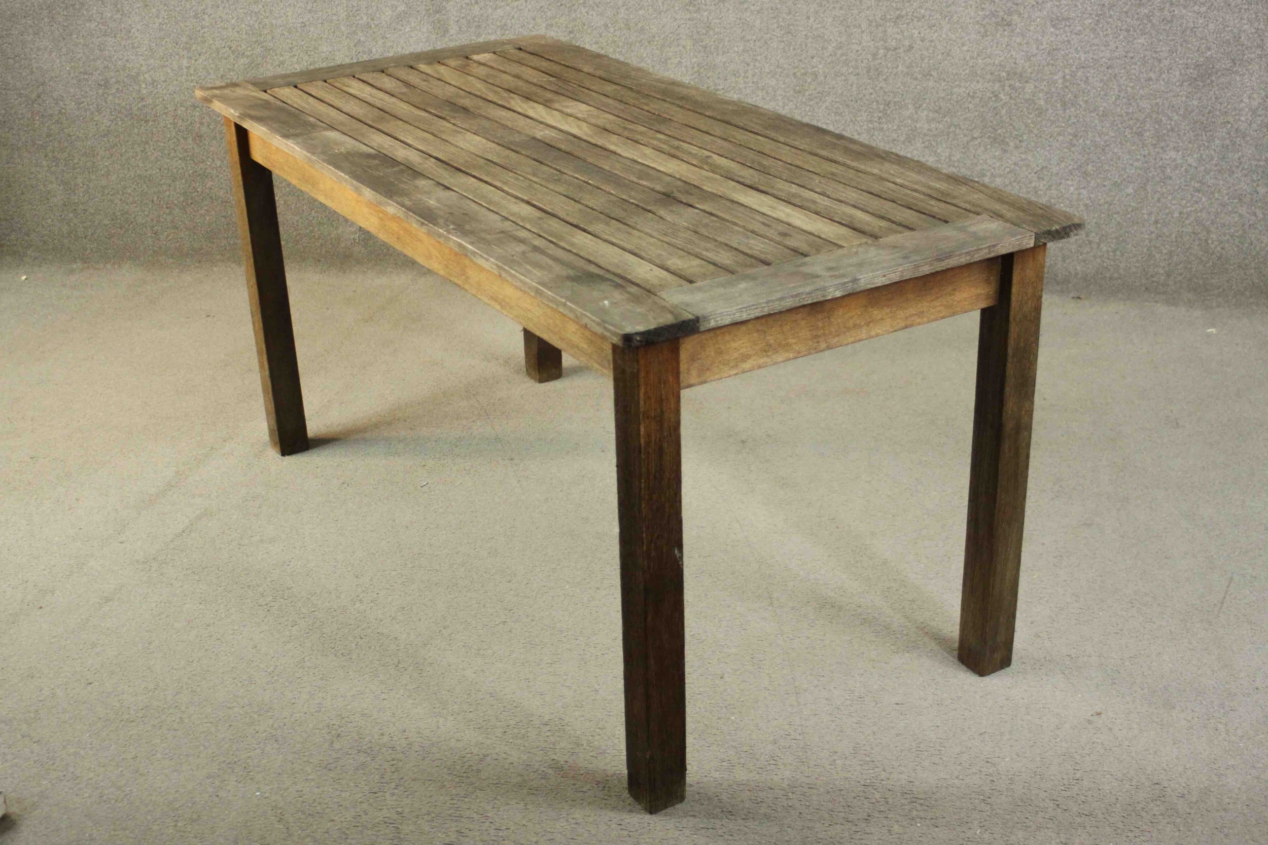 A contemporary Barlow and Tyrie oak garden dining table, with a rectangular slatted top on square - Image 7 of 8