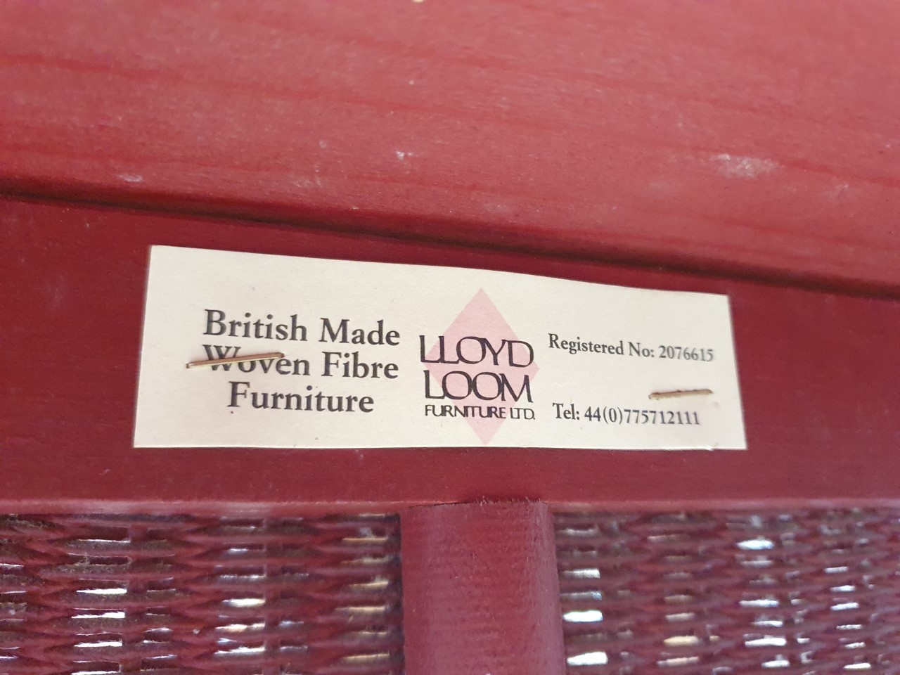 A red Lloyd Loom woven wicker tub chair, bearing brass Lloyd Lloom label. - Image 7 of 7