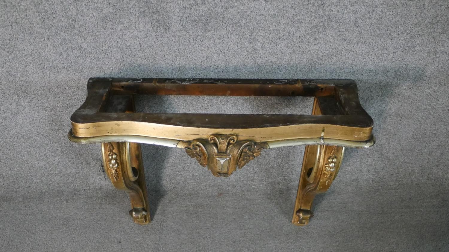 A 19th century Italian parcel gilt and silvered console table, wall mounted but missing the marble - Image 5 of 8