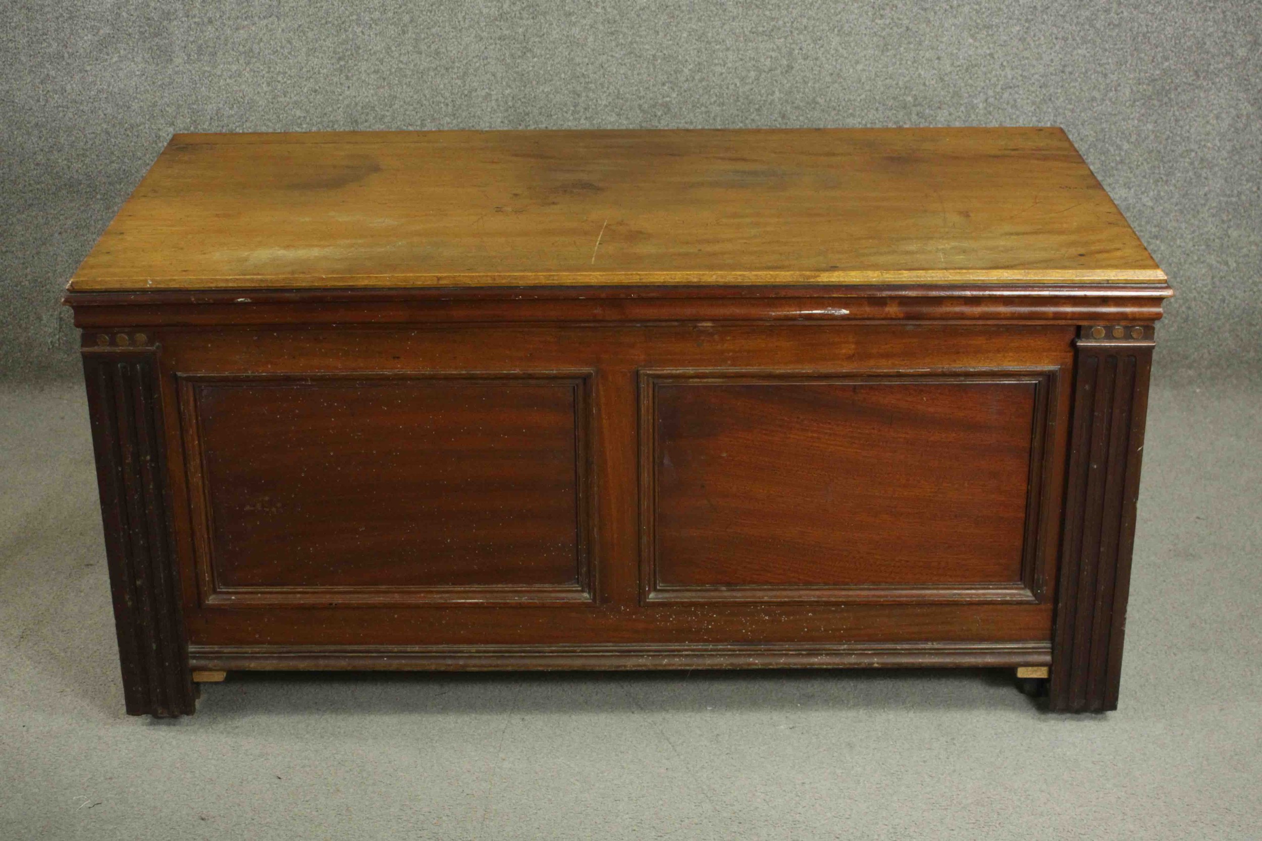 A 19th century mahogany coffer, of rectangular form, the top with a moulded edge, the panelled