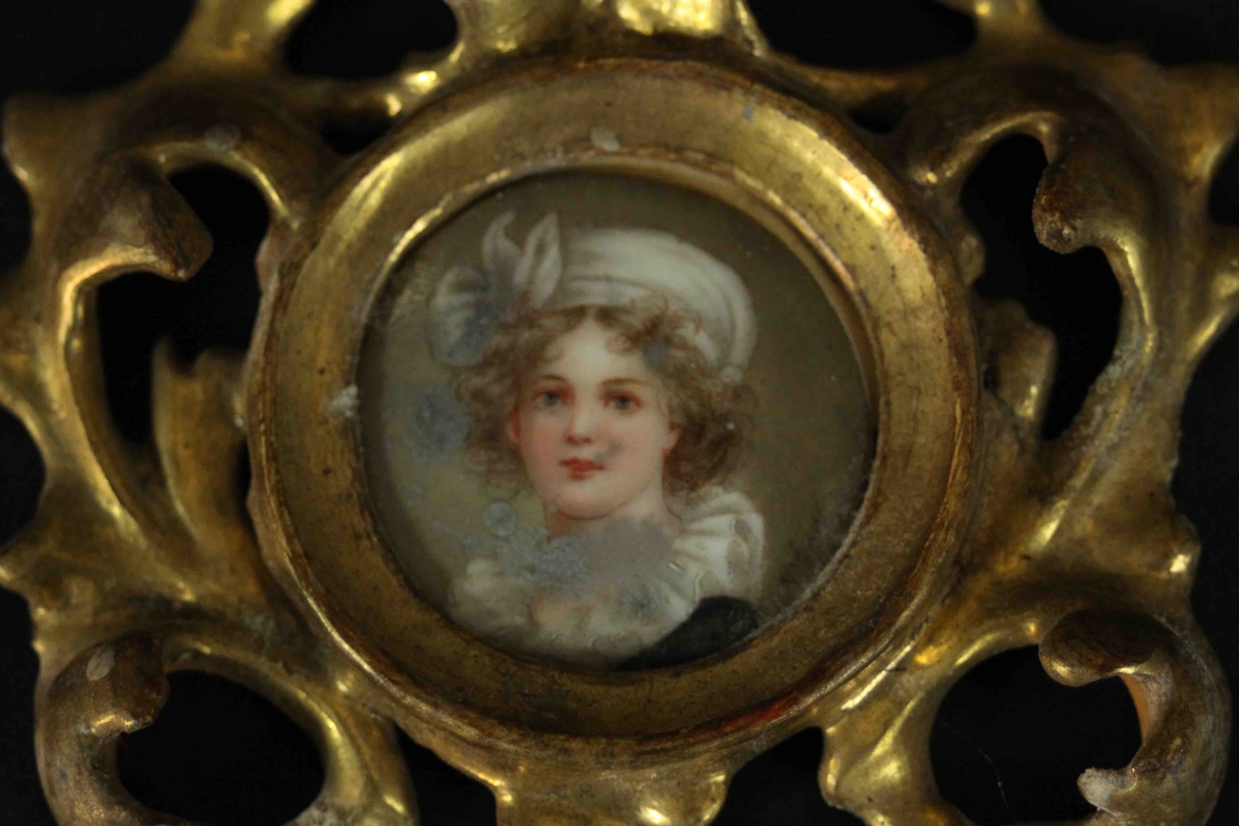 A pierced and carved giltwood framed hand painted miniature portrait on porcelain of a young lady, - Image 3 of 4