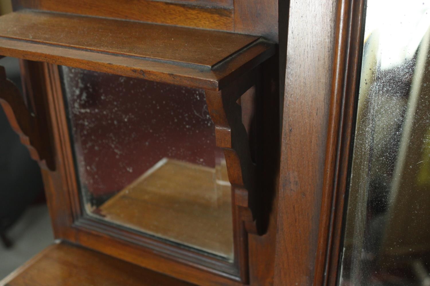 A late Victorian walnut dressing chest, with a central bevelled swing frame mirror, flanked by two - Image 10 of 11