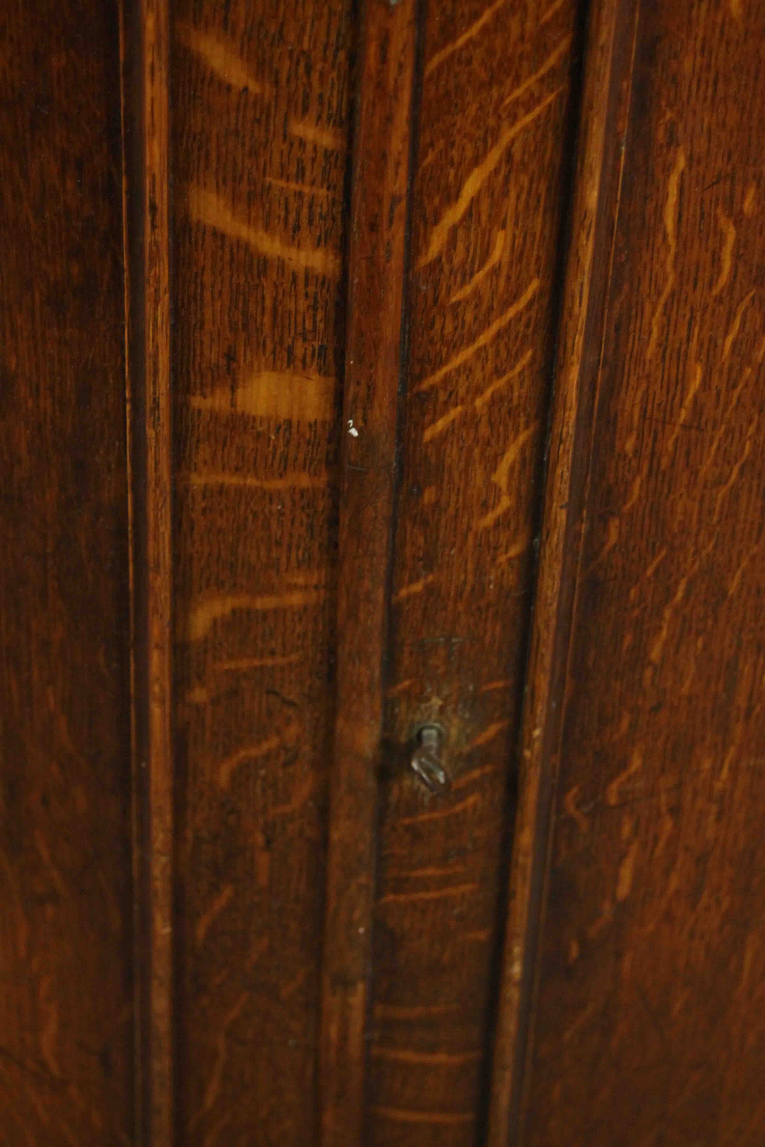 A 19th century oak bow fronted corner cabinet, with two doors opening to reveal a shelf on a - Image 5 of 7