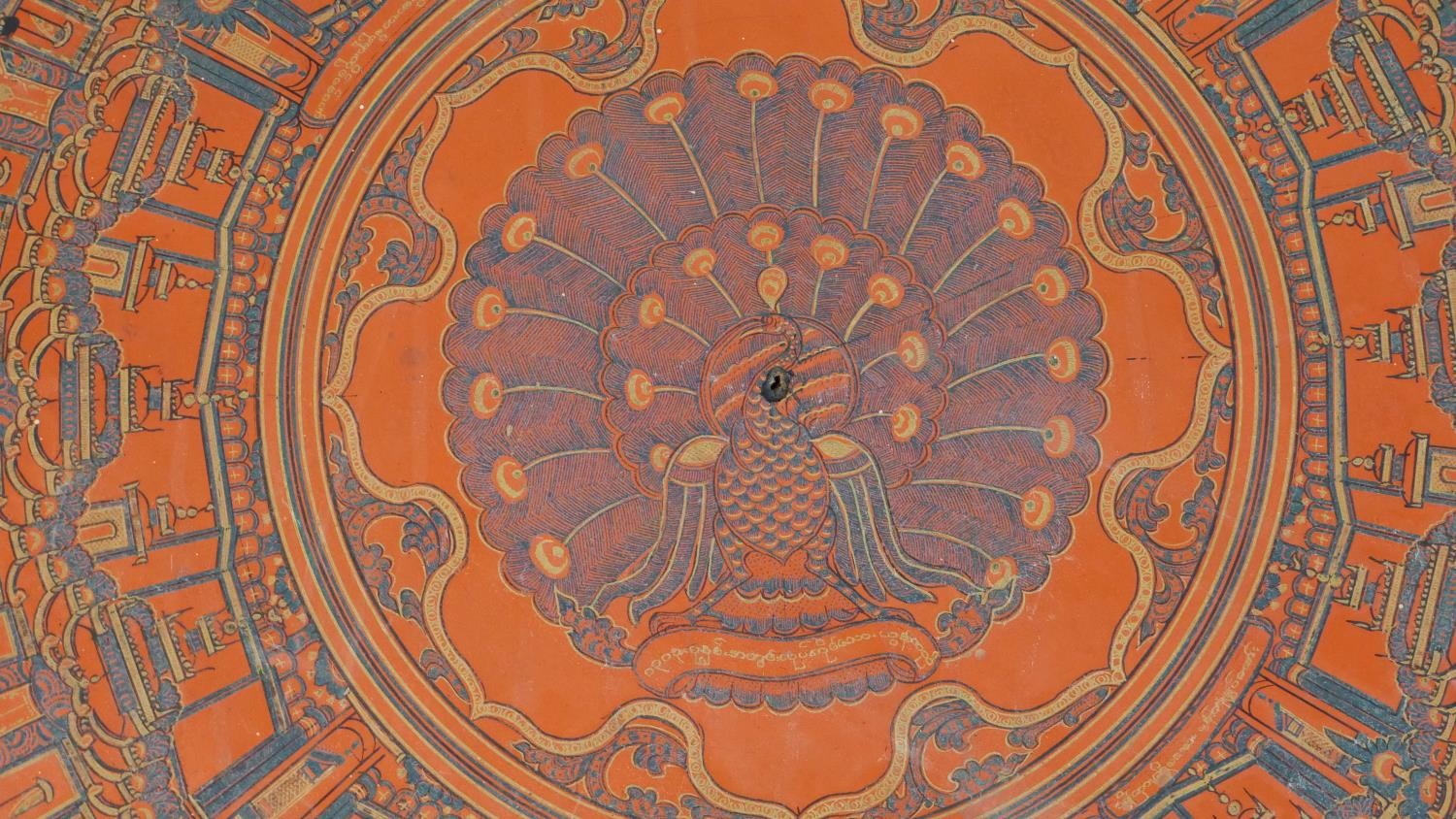 A 19th century engraved lacquer mandala, decorated with figures of Buddha and a peacock to the - Image 3 of 8