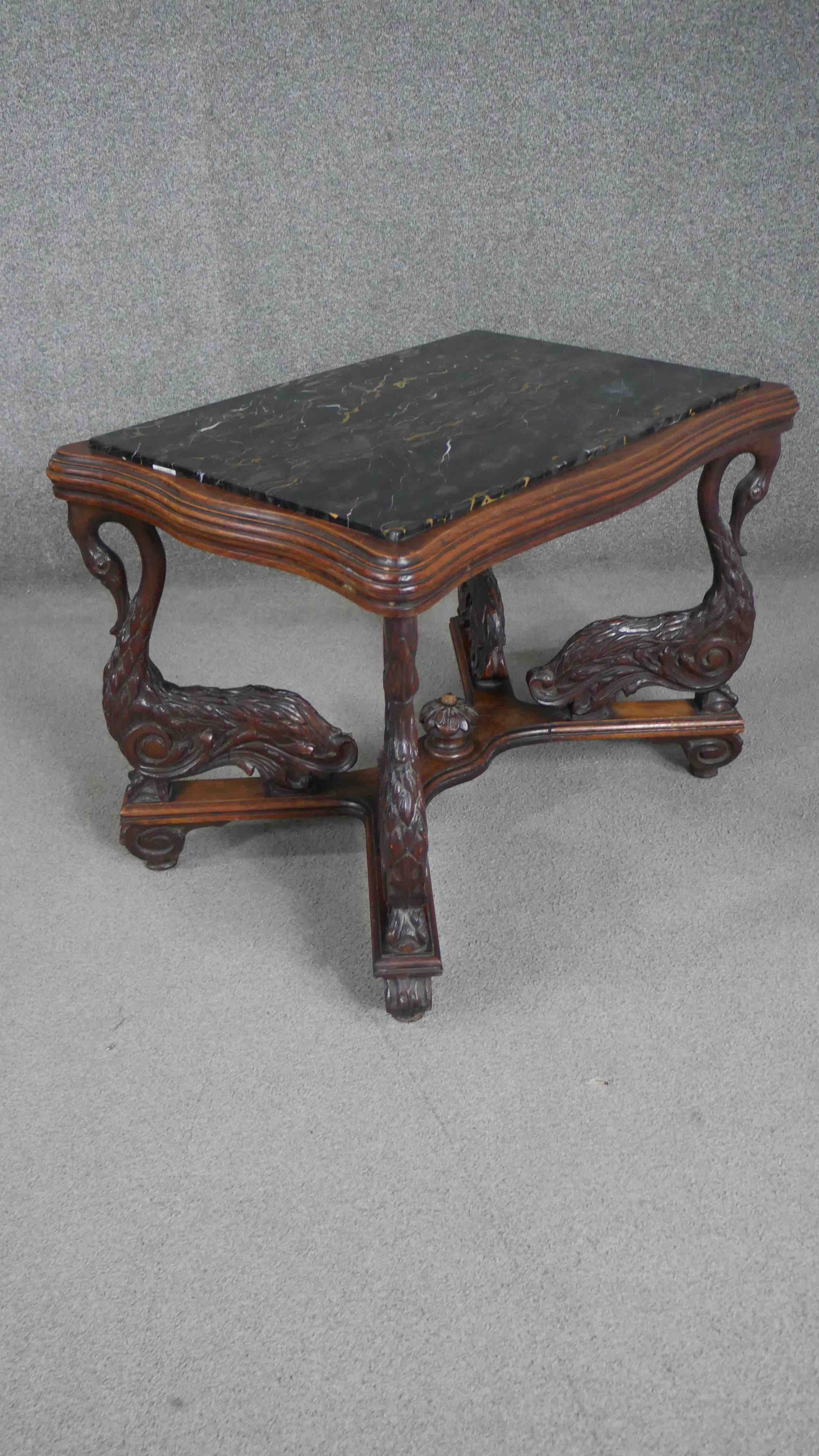 A 19th century Italian walnut centre table, of cartouche form with a marble top raised on carved - Image 3 of 6