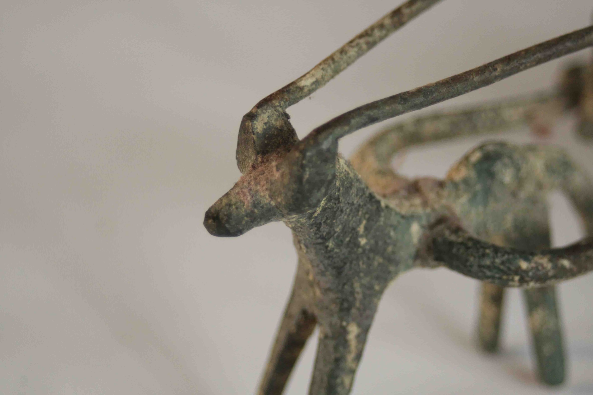 An ancient Greek style bronze of a man riding a horse drawn cart. H.8 W.14 D.6cm. - Image 7 of 8