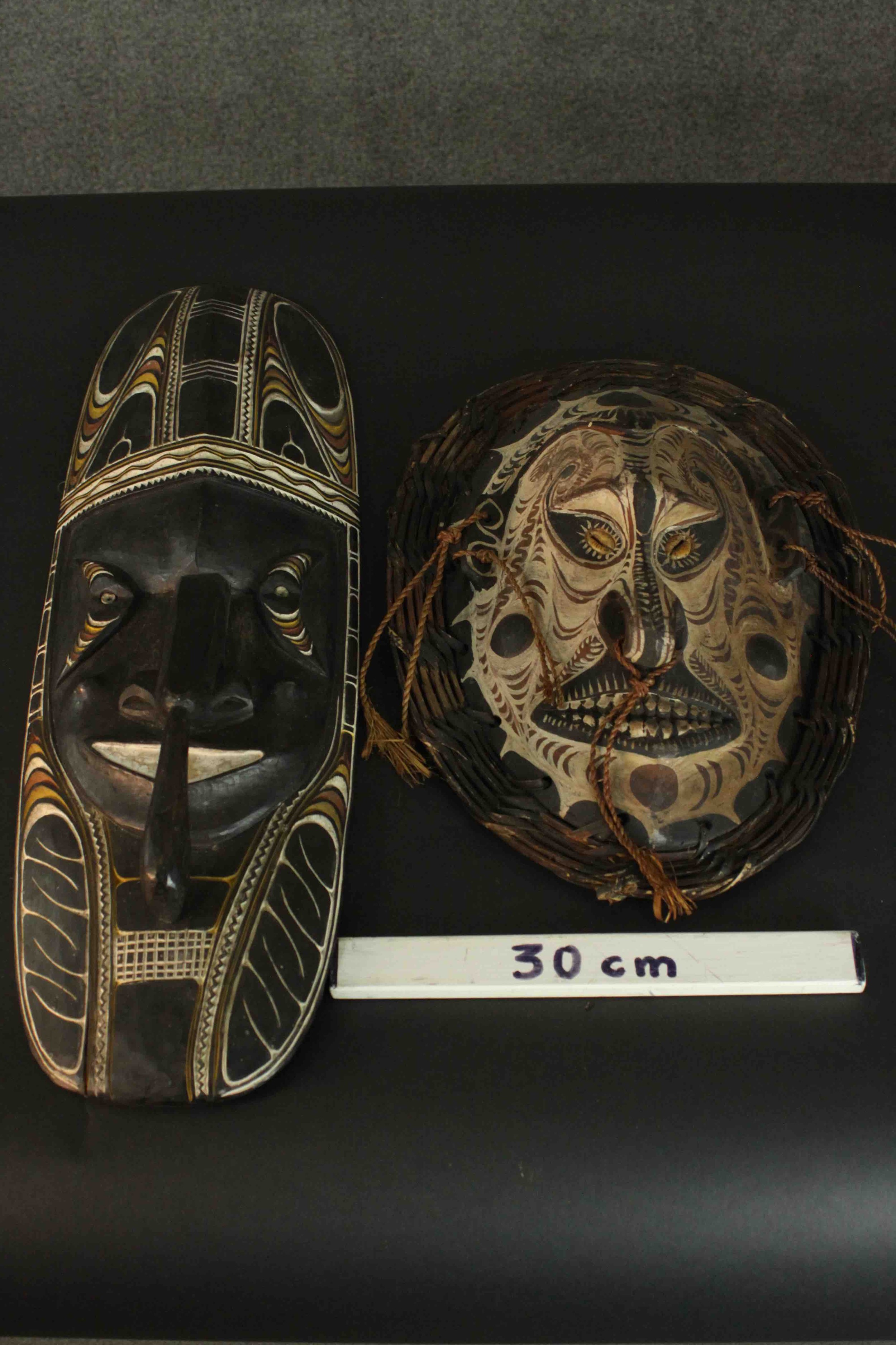 One ancestral mask from Papa New Guinea along with a painted and carved early 20th century African - Image 9 of 9