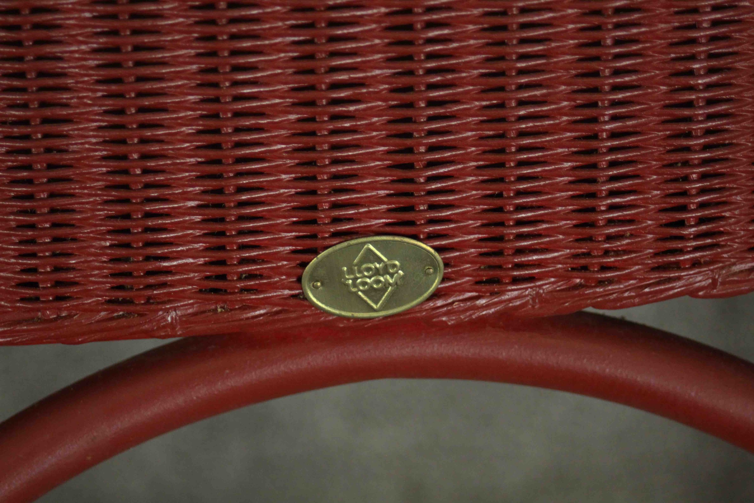 A red Lloyd Loom woven wicker tub chair, bearing brass Lloyd Lloom label. - Image 6 of 7