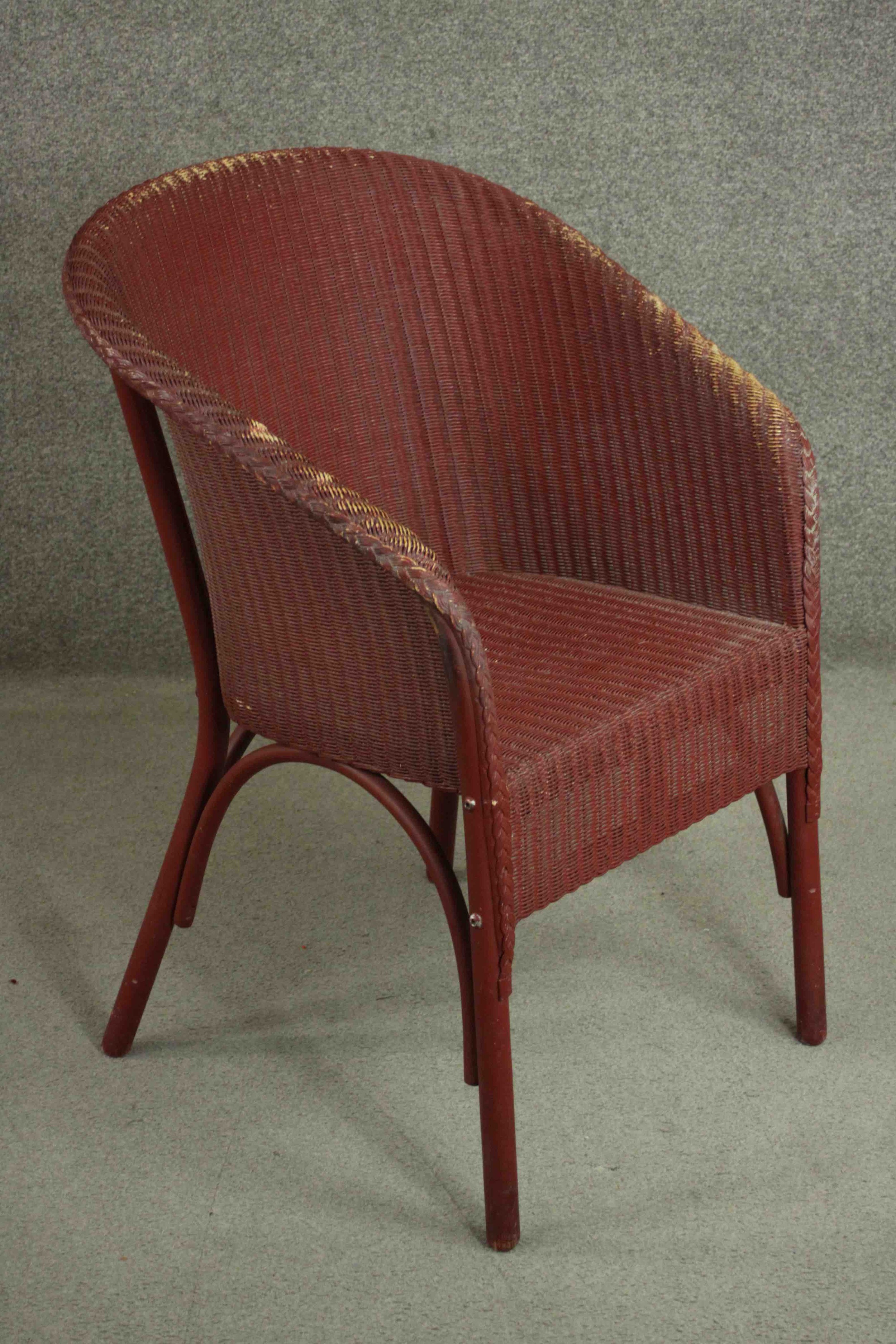 A red Lloyd Loom woven wicker tub chair, bearing brass Lloyd Lloom label. - Image 2 of 7