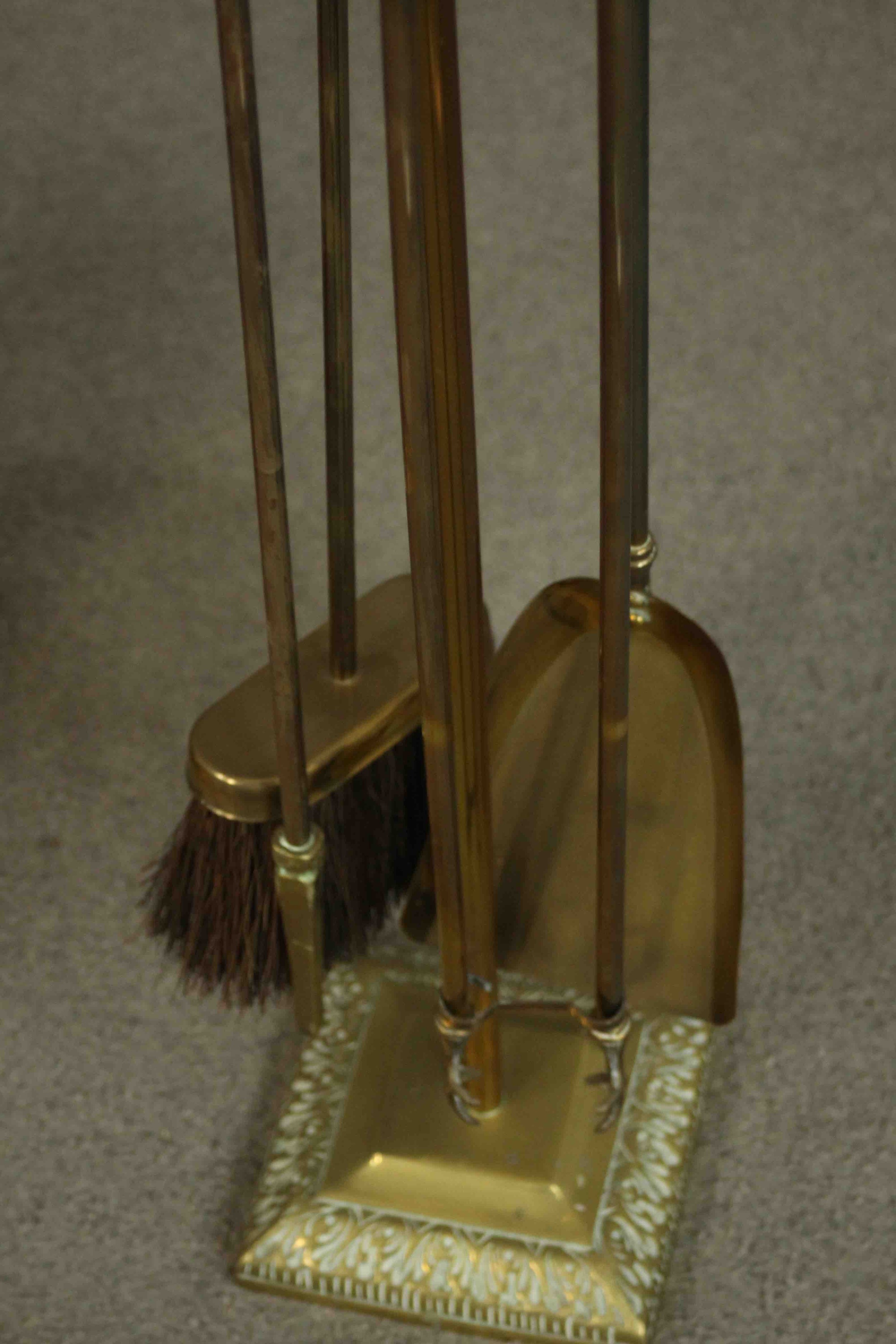 A Victorian brass coal bucket with a swing handle, together with a brass fireside companion set - Image 4 of 6