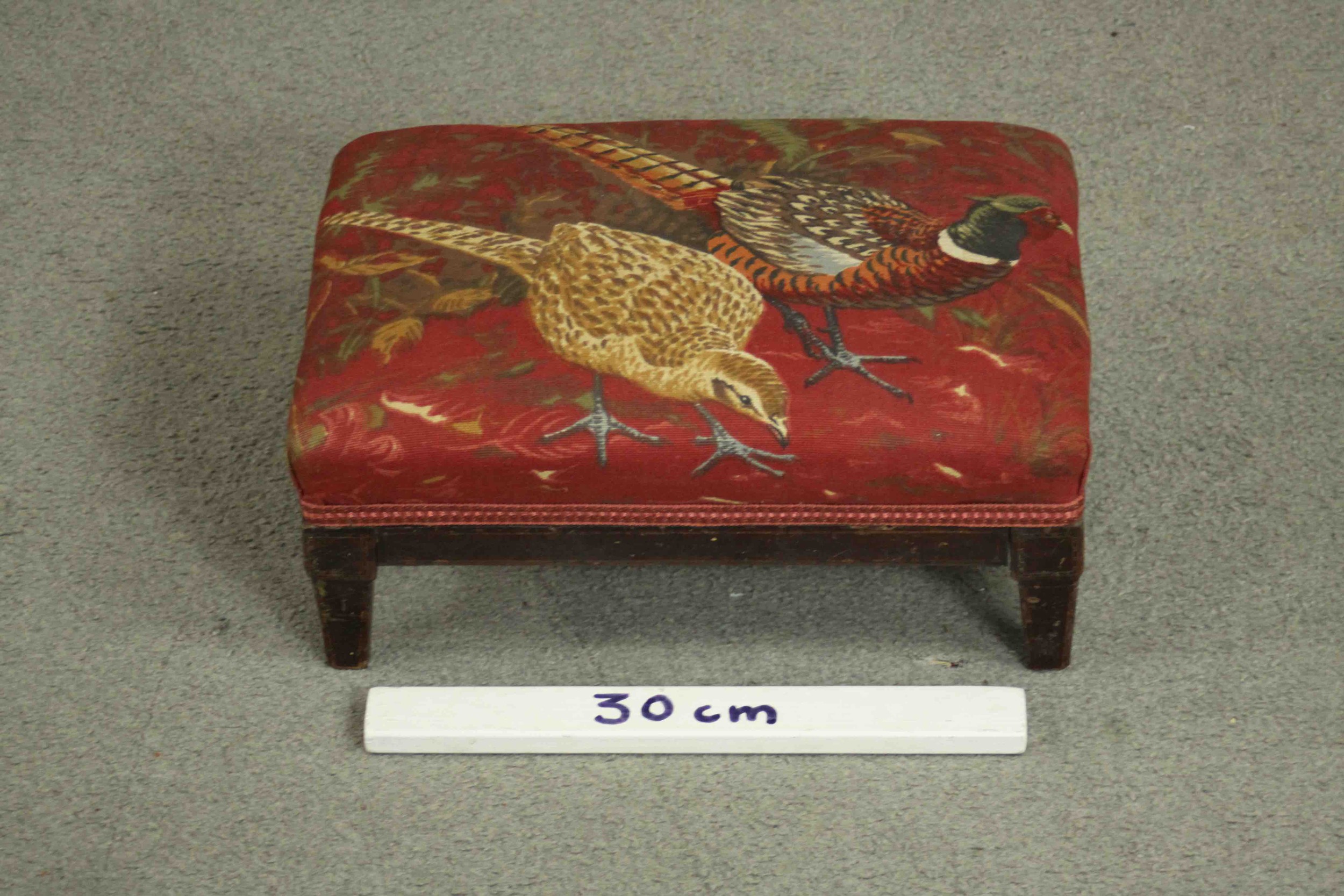 A 20th century foot stool with a padded tapestry top with pheasant design. H.15 W.37 D.28cm. - Image 2 of 4