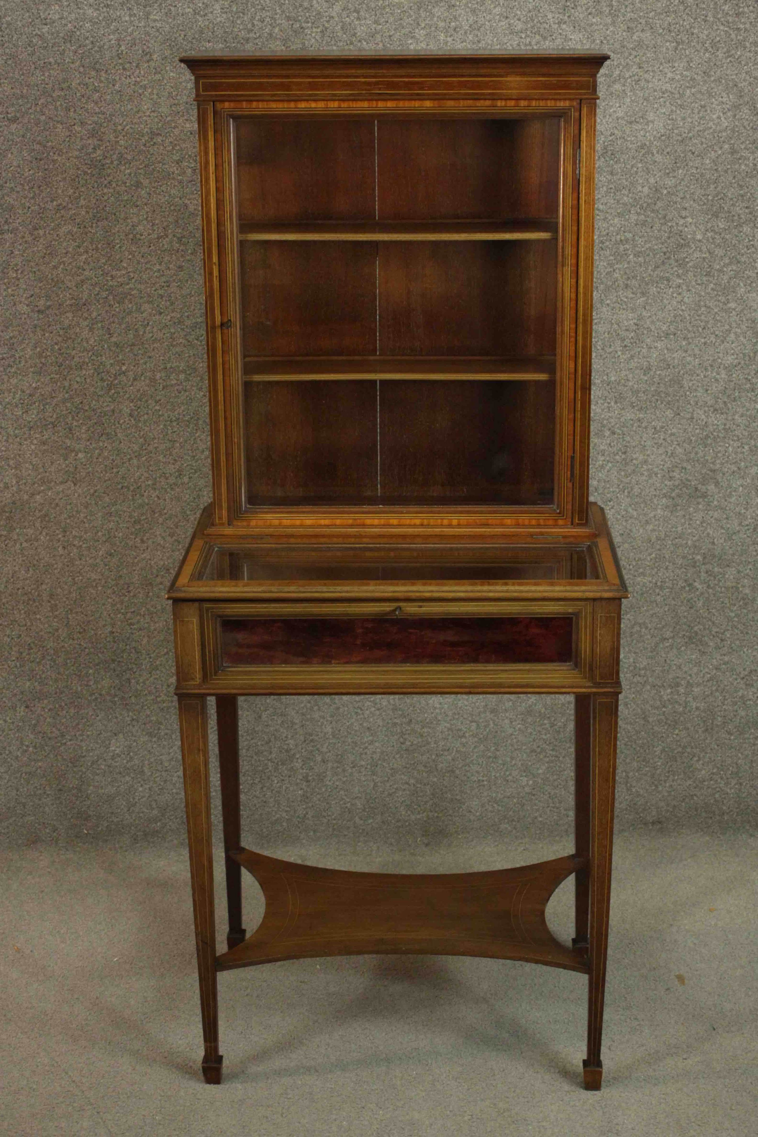 An Edwardian Sheraton revival display cabinet, crossbanded with satinwood and line inlaid, the upper