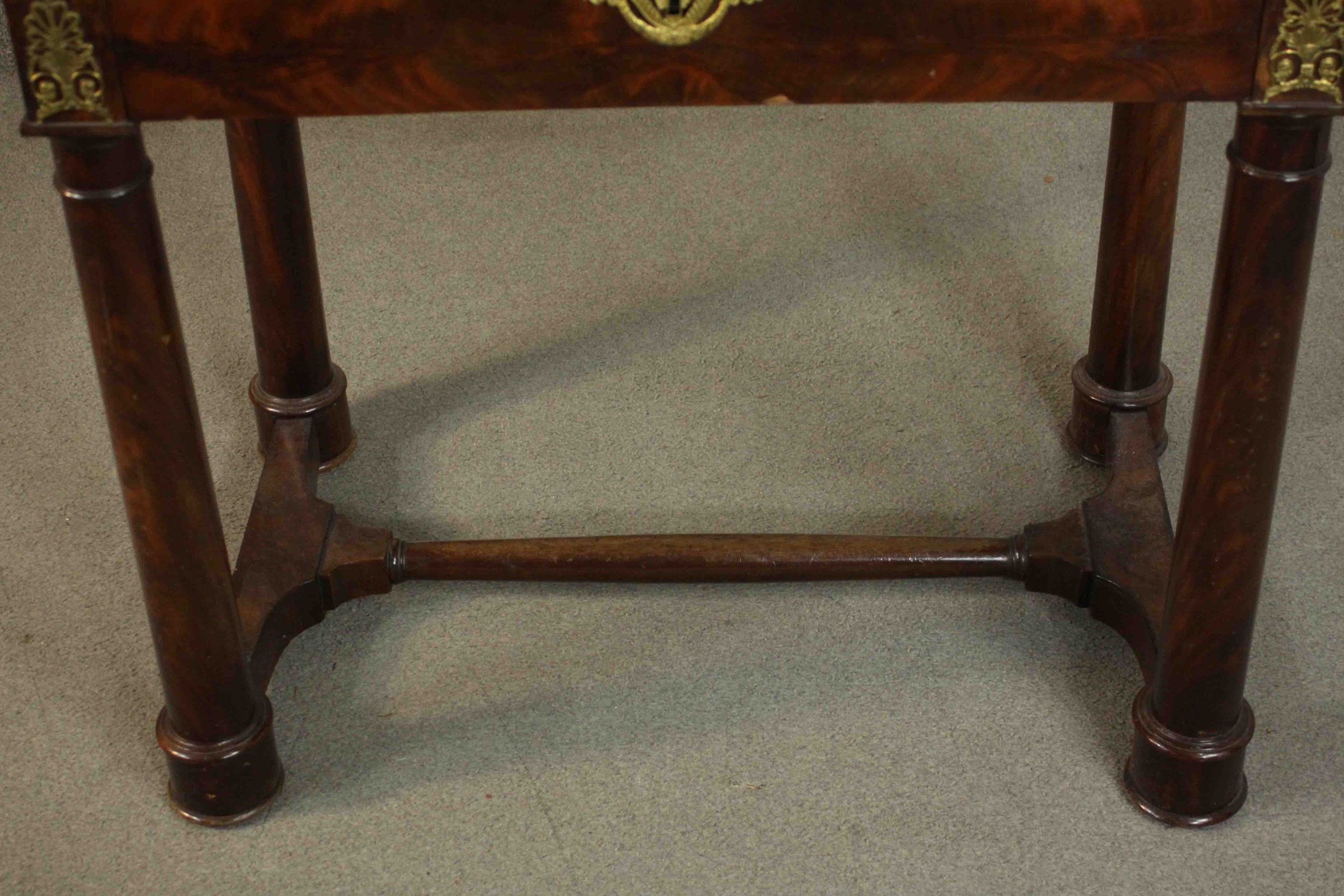 A French Empire flame mahogany writing table, the superstructure with three short drawers, over a - Image 9 of 9