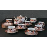 A Royal Crown Derby hand painted six person 'Imari Fern' pattern tea set. Maker's mark to base. (