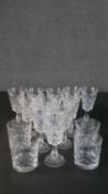 A collection of eleven hand cut Stuart crystal sherry glasses along with four Edinburgh crystal