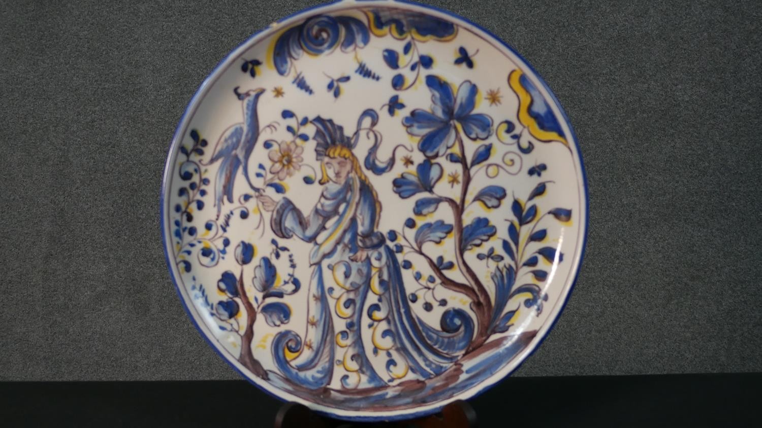 A FCA Sant'Anna Portuguese hand painted ceramic charger with a lady and a bird in the garden along - Image 2 of 10