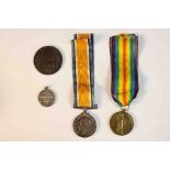 A collection of medals including two WW1 medals inscribed around the rim '2640 WKR.G.A. STONE. O.M.