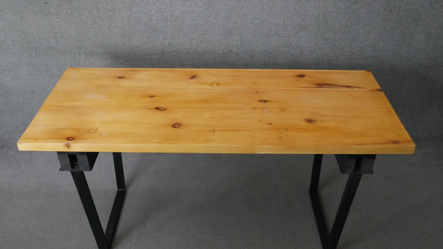 A contemporary pine planked top dining table on metal trestle supports. H.83 W.174 D.72cm - Image 4 of 5