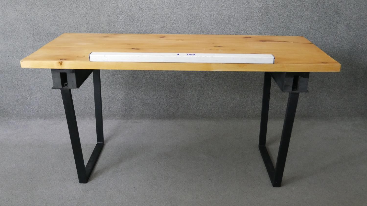 A contemporary pine planked top dining table on metal trestle supports. H.83 W.174 D.72cm - Image 2 of 5
