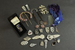 A collection of costume jewellery, including fifteen diamante Art Deco scarf clips, three early 20th