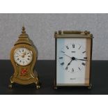 Two vintage clocks, a brass quartz carriage clock by Smiths and Looping Swiss Giltwood spire form