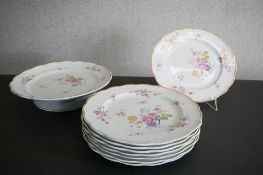 A set of eight hand painted floral design dinner plates and a matching cakestand. Impressed maker'