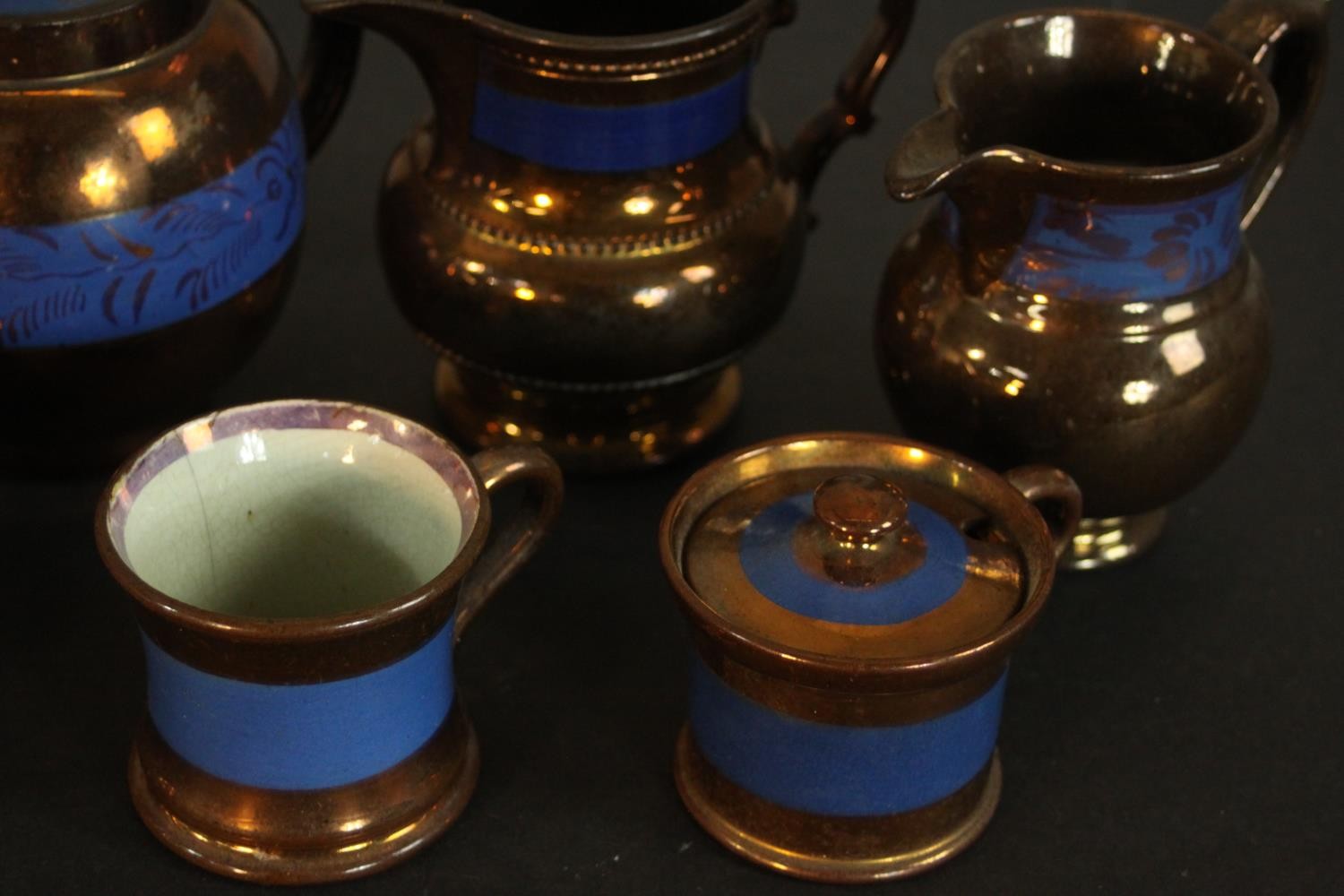 A collection of 19th century copper lustre items, comprising a teapot, jugs, cups, and a preserve - Image 6 of 8