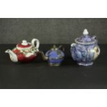 Three porcelain and pottery teapots, two made for the Persian market with portraits of Naser al-