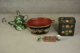 A collection of 20th century toleware items, including a bread bin with floral design, twin