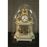 A Late 19th century French alabaster portico clock, under a glass dome, the circular enamelled